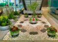 Container gardens under stairways provide a nice display of office plants for lobby space, Plantwerks serving Boston, Metrowest, NH, ME, New Hampshire, Maine