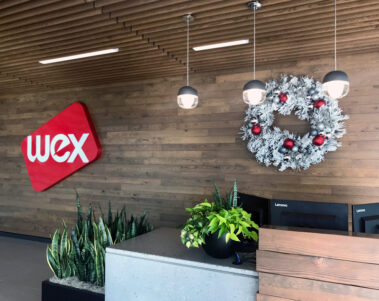 Holiday wreath and green plants welcome visitors